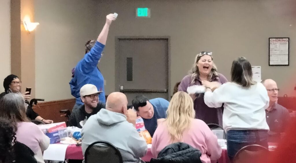 A winner receives her meat prize