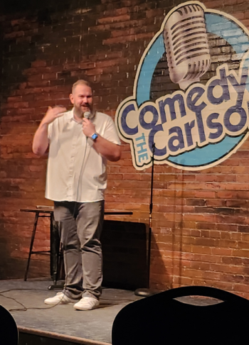 Vinnie Paulino performing on stage